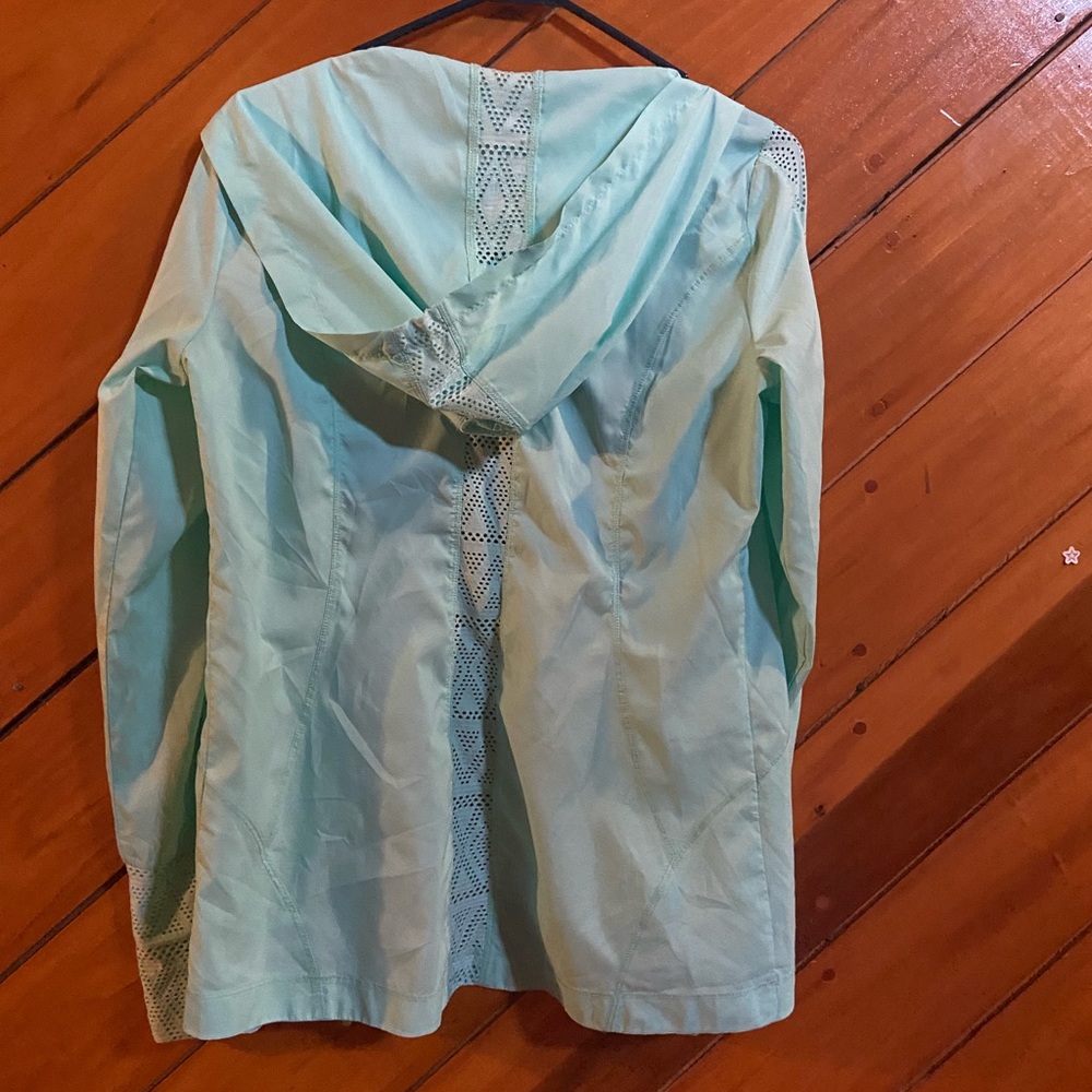 Turquoise rain jacket